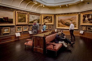 Visitors looking at the paintings of The Mesdag Collection
