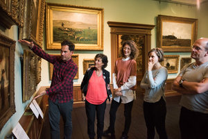Visitors listening during a guided tour at The Mesdag Collection